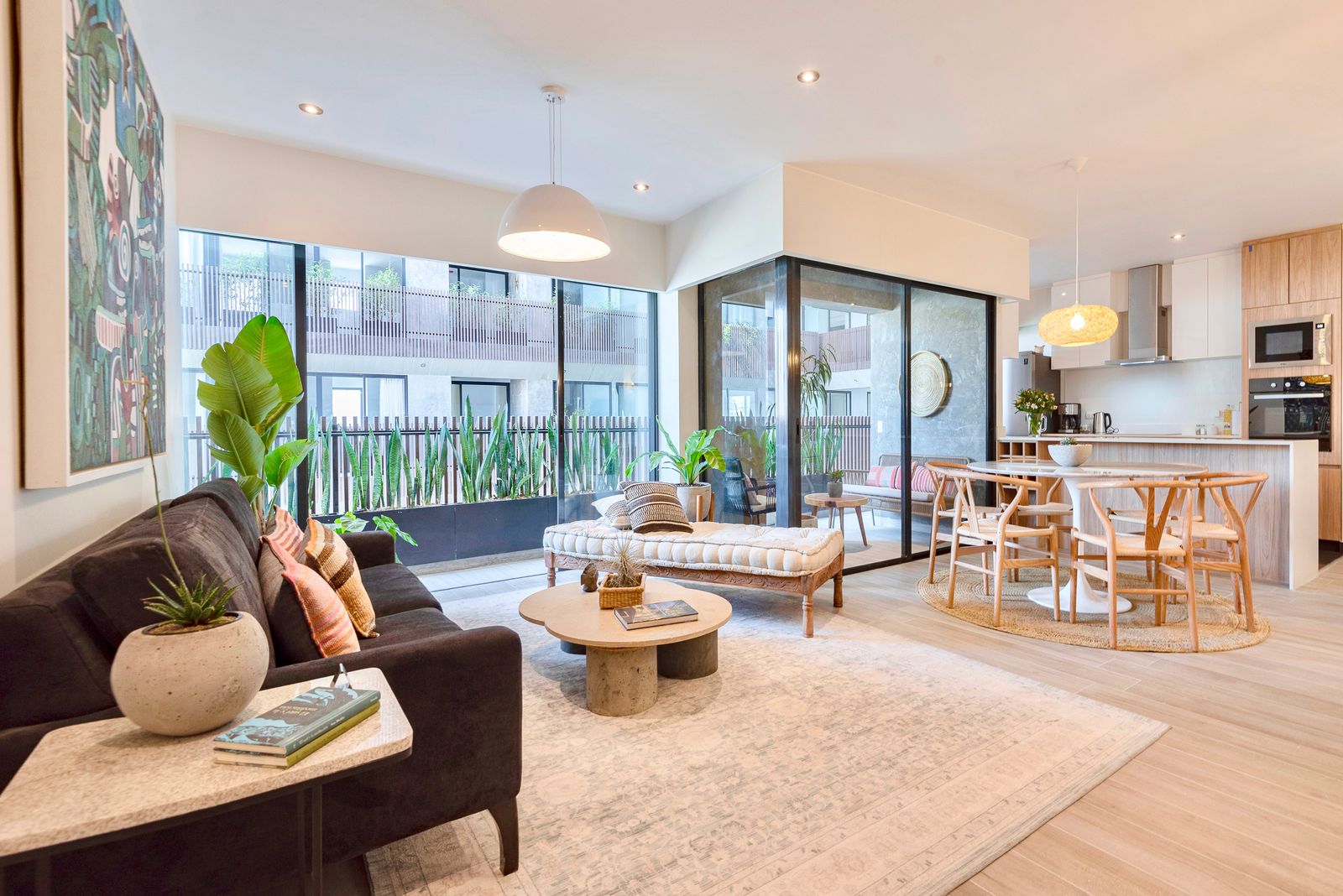 Open-plan living and dining space at Maras Residence